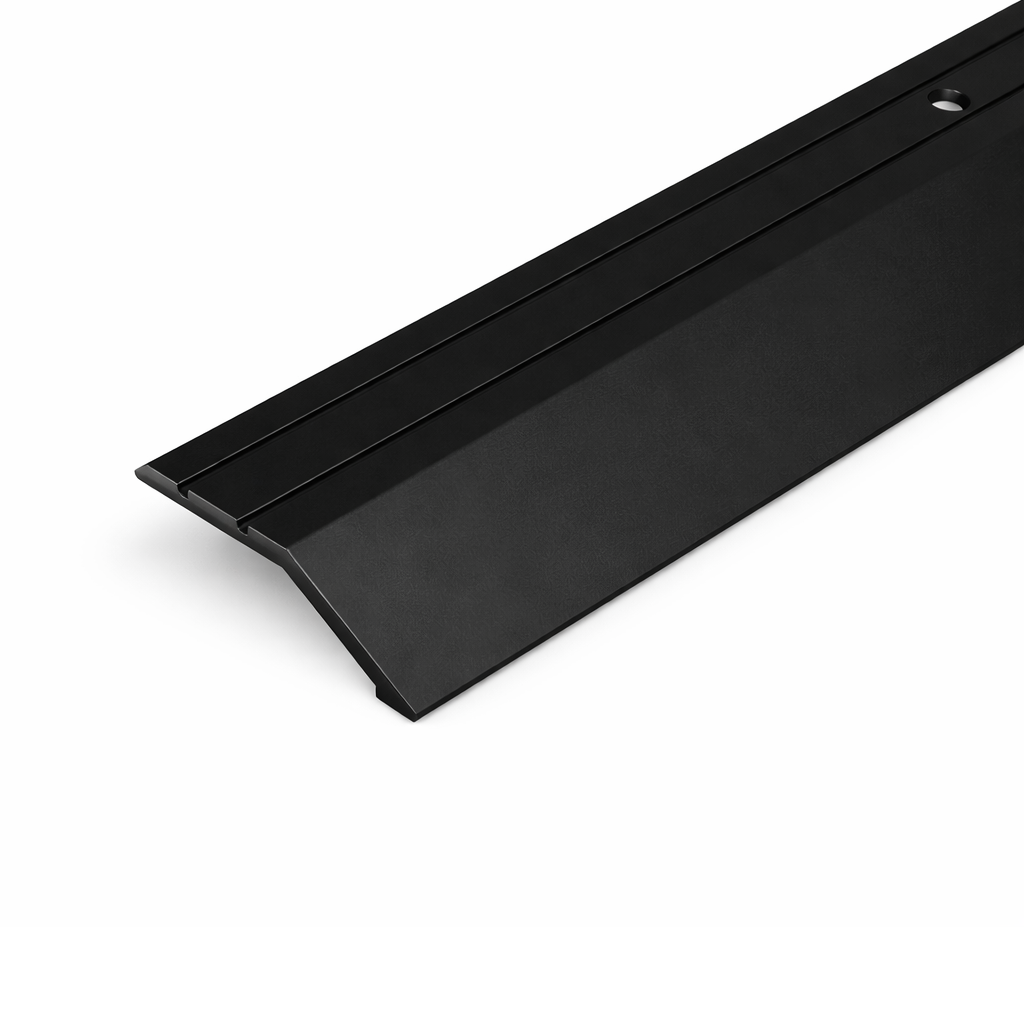 Black A11 anodised aluminium ramp door threshold profile providing a gradual and durable floor transition.