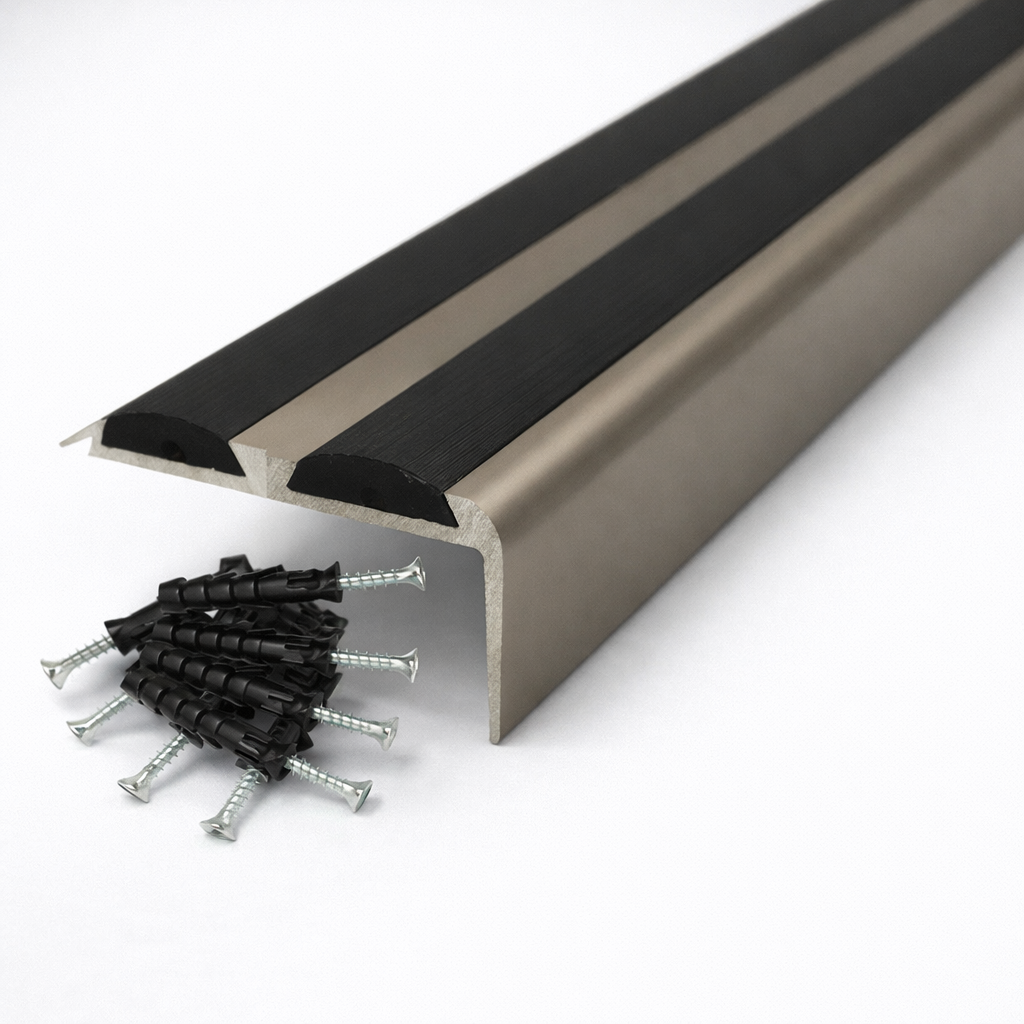 Champagne Anodised aluminium stair nosing with rubber inserts installed on staircase step