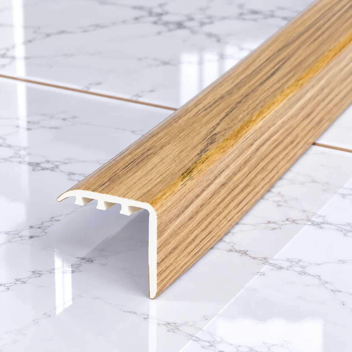 Laminate Stair Nosing 30x30mm uPVC Wood Effect Profile – 0.9m In Oak Color