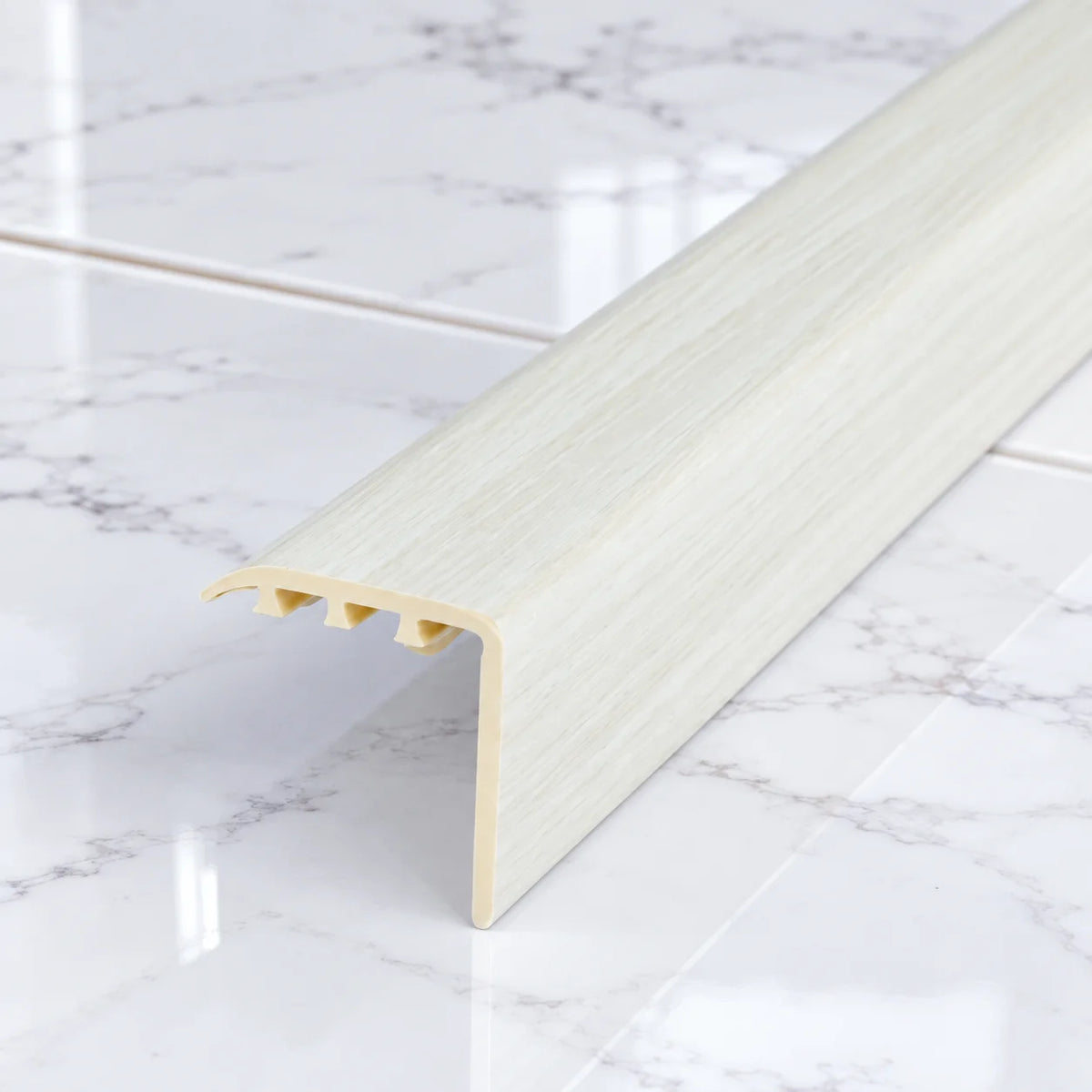 Laminate Stair Nosing 30x30mm uPVC Wood Effect Profile – 0.9m In White Oak Color