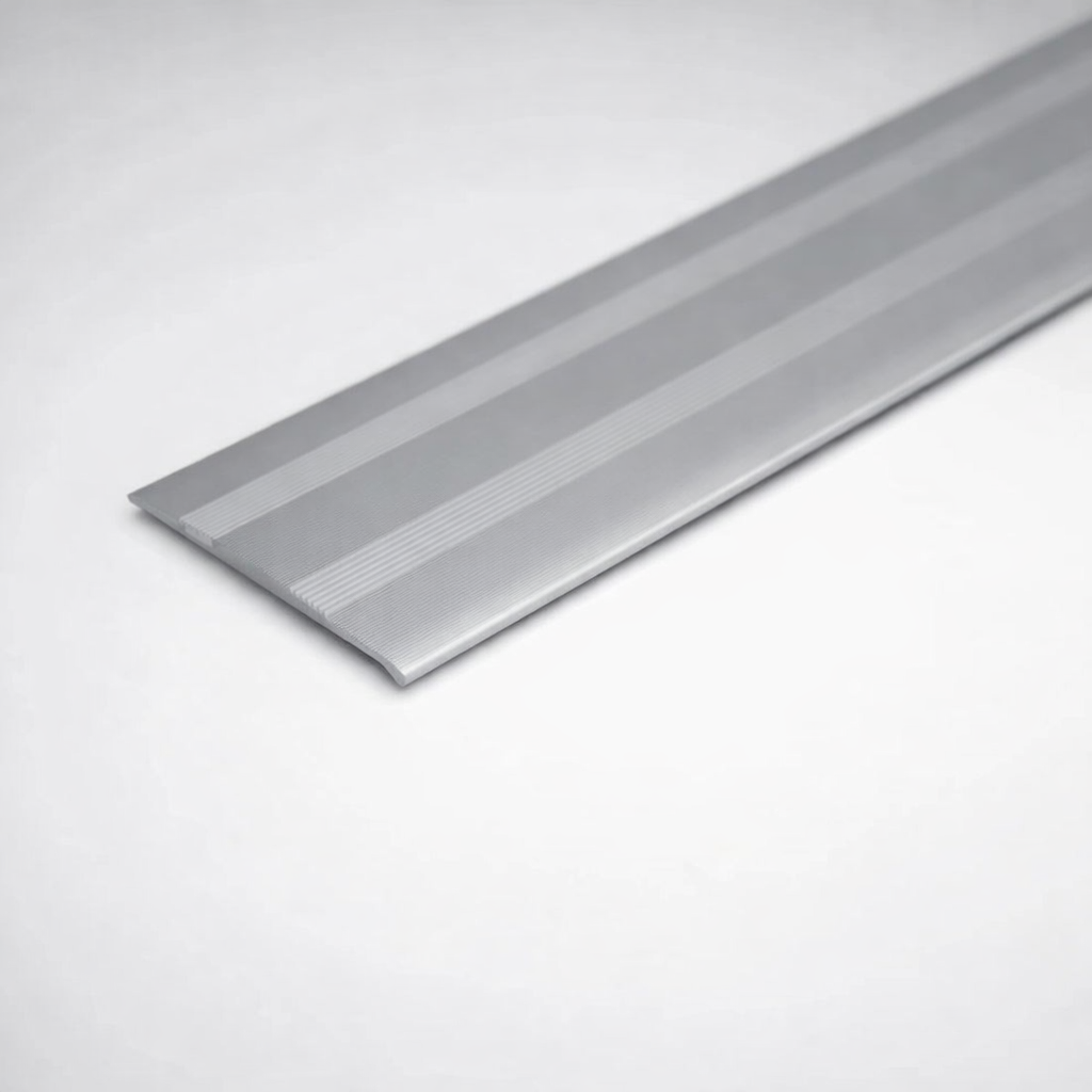 Siler A08 35mm anodised aluminium flat threshold profile for covering floor joints at doorways.