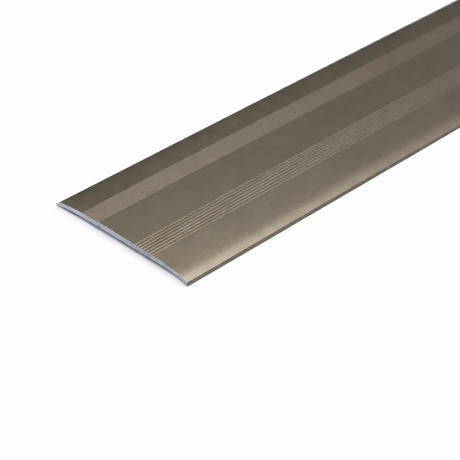 Champagne Anodised aluminium flat door threshold strip with self-adhesive backing for quick, drill-free installation.