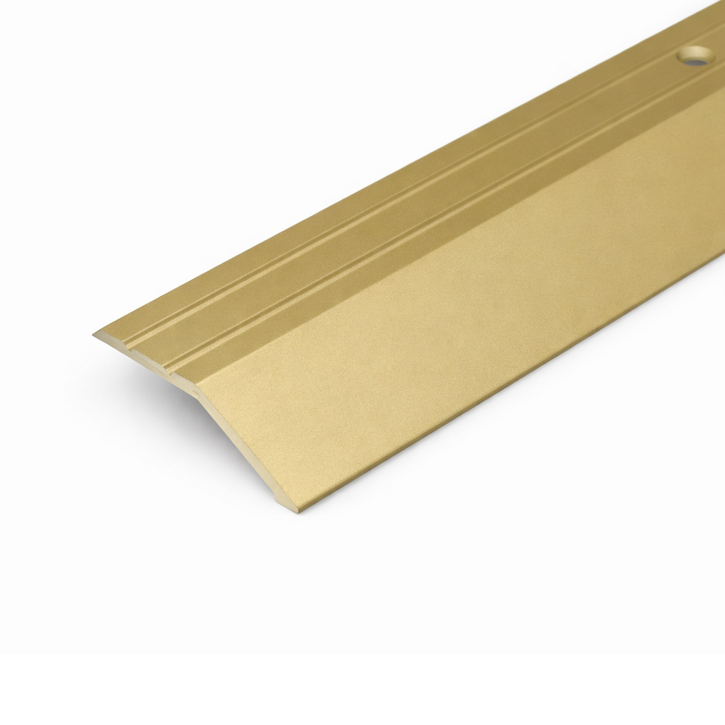 Golden A11 anodised aluminium ramp door threshold profile providing a gradual and durable floor transition.