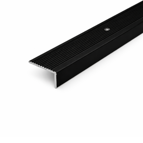 Black A33 40x20mm anodised aluminium non-slip ribbed stair nosing edge trim installed on staircase steps