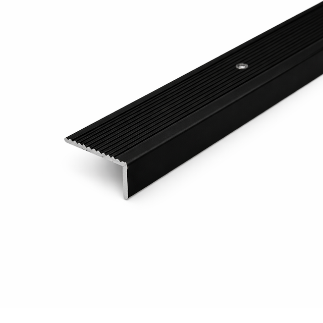 Black A33 40x20mm anodised aluminium non-slip ribbed stair nosing edge trim installed on staircase steps