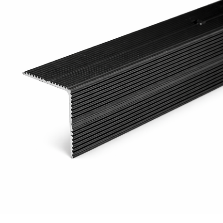 Black A34 35x35mm anodised aluminium non-slip ribbed stair nosing edge trim installed on staircase steps