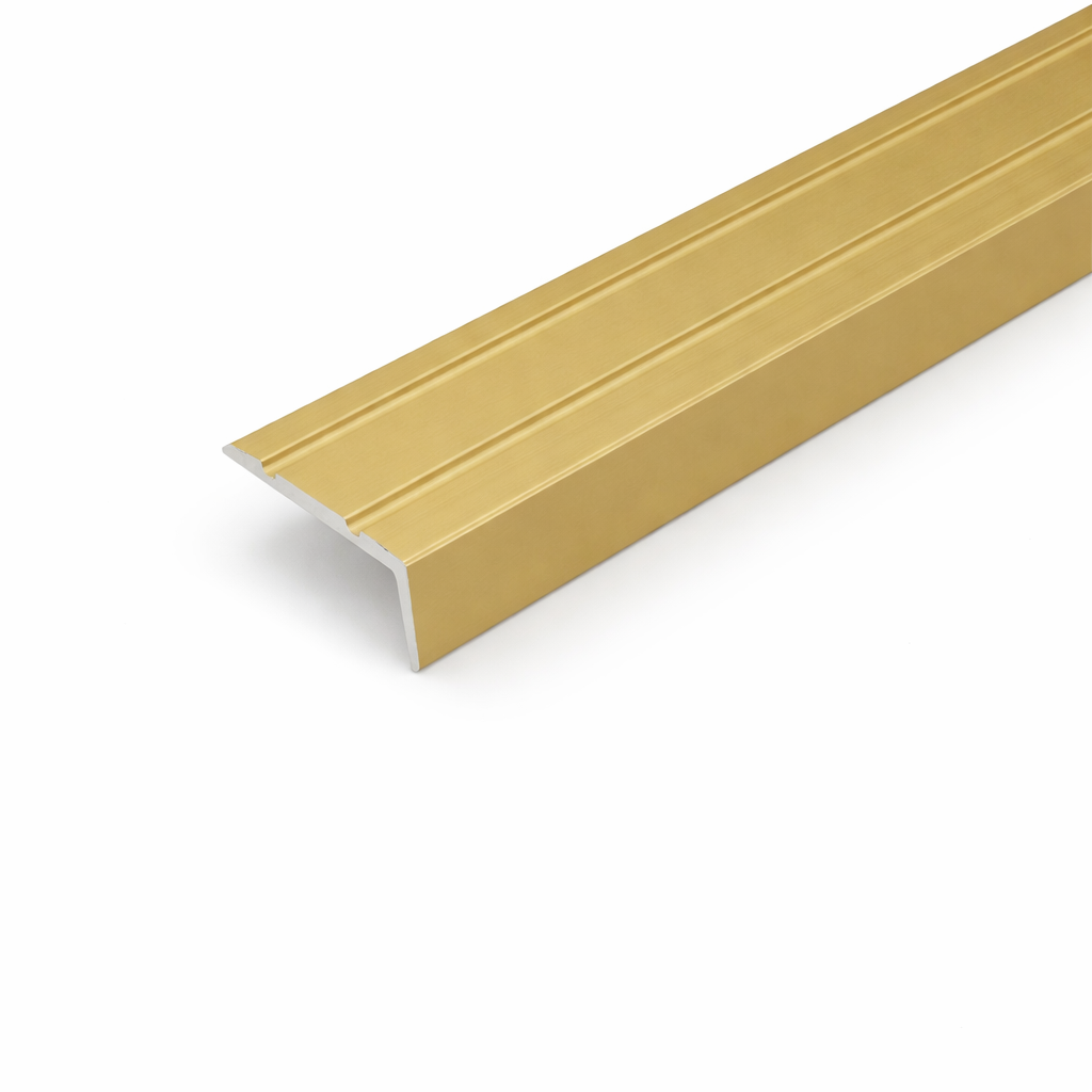 Golden A31 25x10mm anodised aluminium self adhesive stair nosing edge trim installed on indoor staircase for slip protection