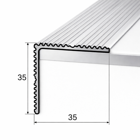A34 stair nosing trim installed on concrete steps using self adhesive backing