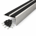 Silver Anodised aluminium stair nosing with rubber inserts installed on staircase step