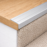 A31 stair nosing trim installed on residential staircase to prevent edge wear and slipping