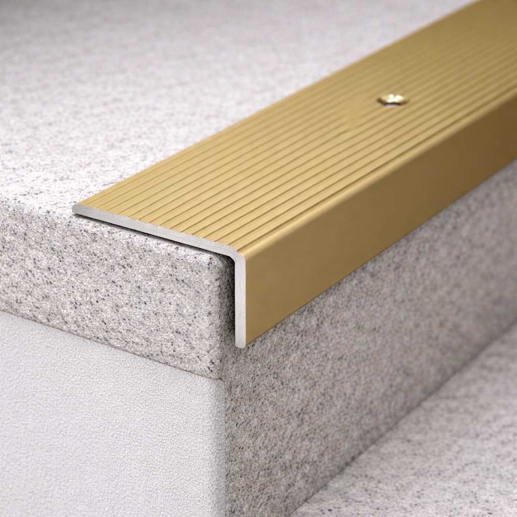 A33 anodised aluminium non-slip ribbed stair nosing installed on step edge for enhanced grip and safety
